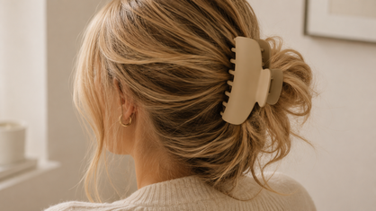 large beige matte claw clip in wavy hair