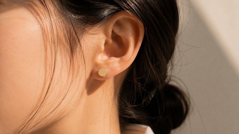 flat metallic gold disc stud earring