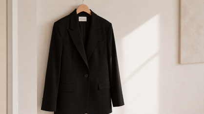 structured black tailored blazer hanging minimalist style